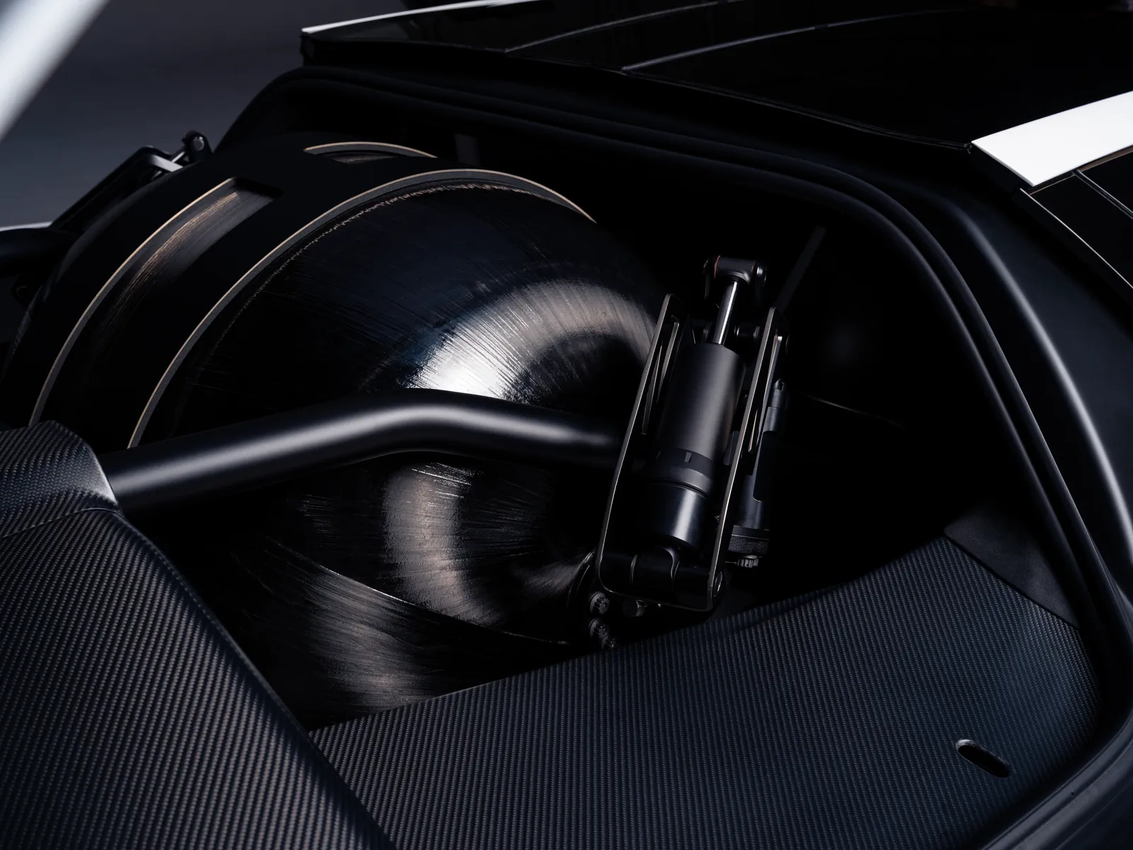 A carbon-fibre overwrapped pressure vessel packed into a void behind the cabin.